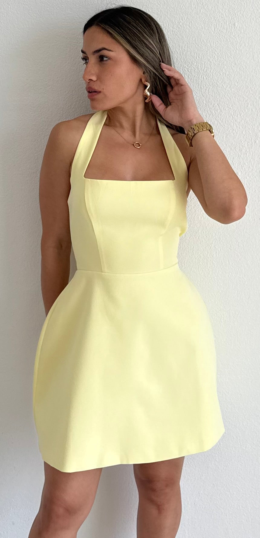 butter yellow fit and flare dress This beautiful fit and flare dress in scuba material would be fab for a summer wedding guest or special occasion. Dress and bag both Ivy Lane, model is the
